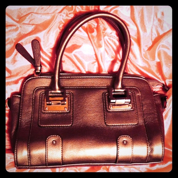 Cute, medium sized purse.  Gold/silver color.