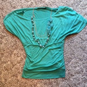 Sea foam green top with flower necklace