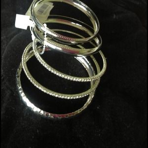 Set of textured gold bangles