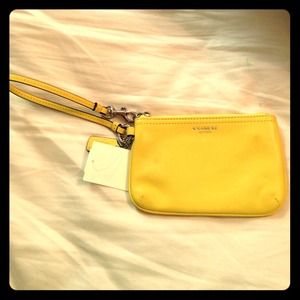 Brand new yellow coach wrislet