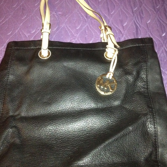 Authentic Michael Kors leather handbag.