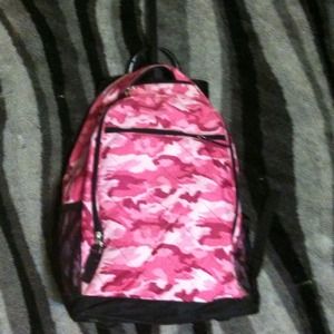 Pink camo rolling backpack