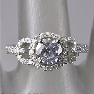 * REDUCED * 1.25 white sapphire & sterling ring!