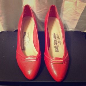 Red and gold buckle heels