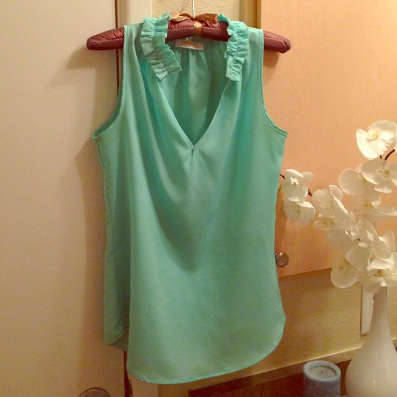 Ruffle Sleeveless Blouse