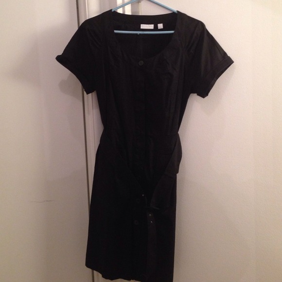 Black button down dress with belt.