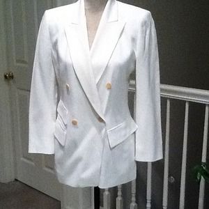 White jacket with two packets on the right.