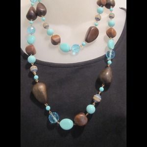 Aqua color glass beads and wood necklace.
