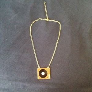 Record player necklace