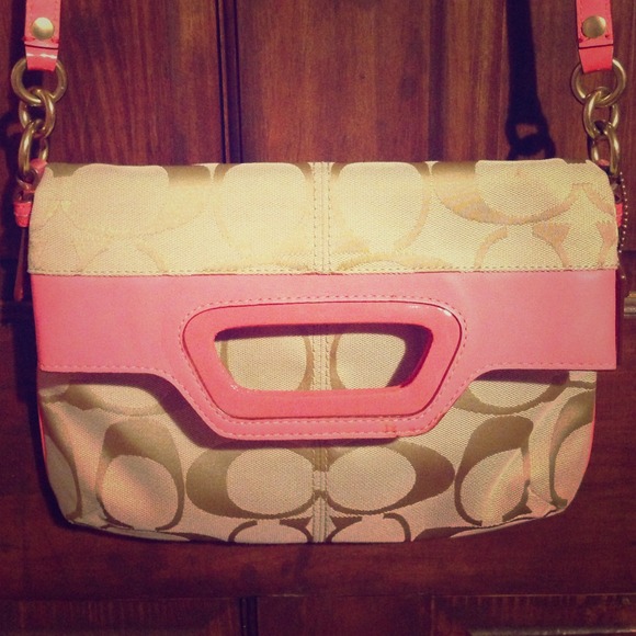 Barely used coral and tan coach satchel!