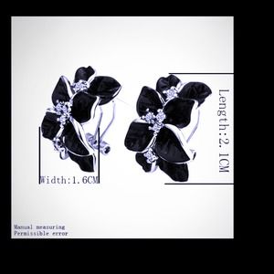 18k white GP Swarovski crystal earrings. Bold