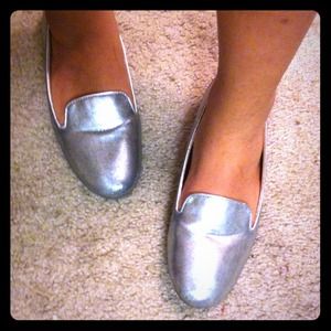 Silver loafers .