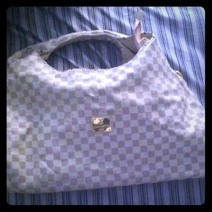 Large Cream and tan Louis Vuitton .