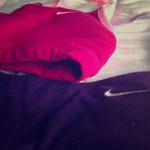 Two Small Nike Sports Bras.