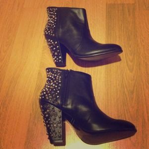 Black booties with hard wear