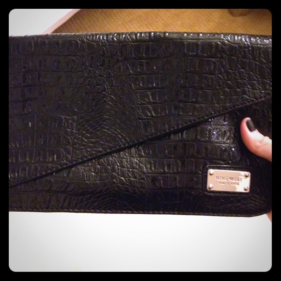 Black snake skin clutch Nine west