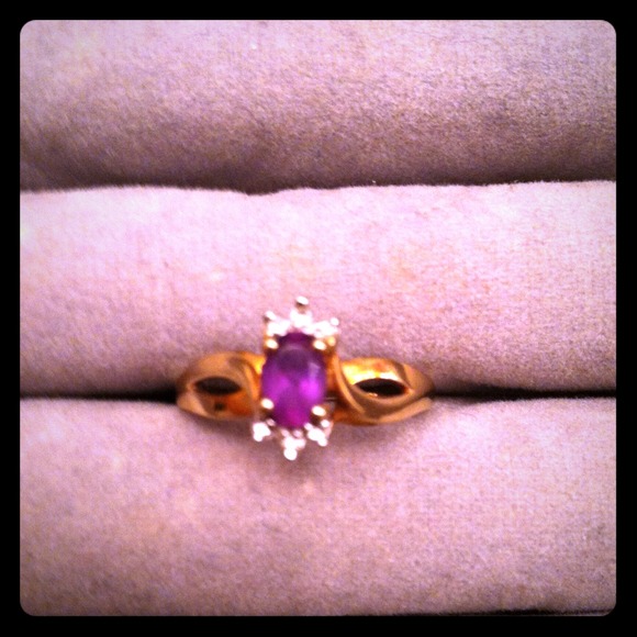 Lovely amethyst and diamond ring set in 10k gold.