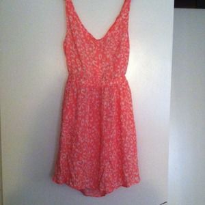 Pink leopard cutout back dress .