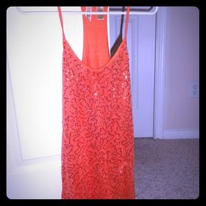 Orange sequined tank from Buckle.