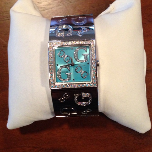 Silver and light blue guess watch w stone details