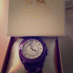 Coach stainless steel ladies watch.