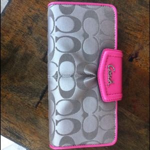 Pink lined coach wallet