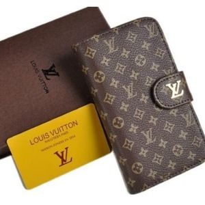 Louis Vuitton iPhone 4 wallet. iPhone 5 available.
