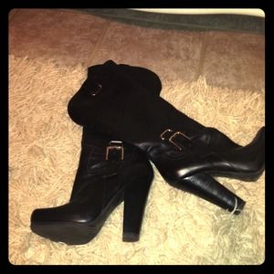 Black knee high boots with hidden platform