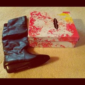 Black leather over the knee boots with wedge hill