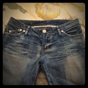Low-rise vintage wash jeans