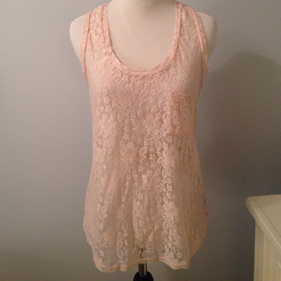 Beautiful lacy tank top can be very dressy