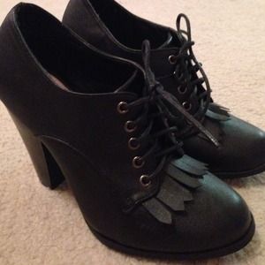 Black leather high heel booties