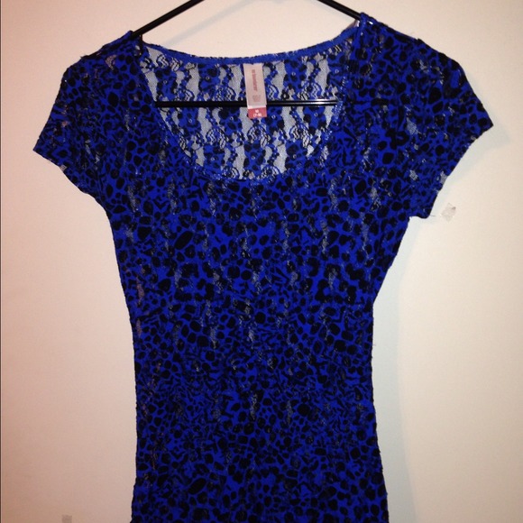 Animal print Lacey see through blouse. NWT