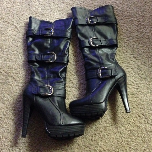 Black bucked high heel boots