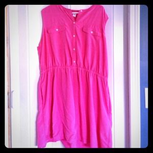 Pink sleeveless dress with elastic waiste.