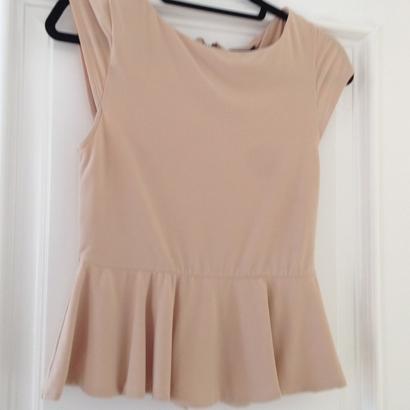 Peplum tan top.