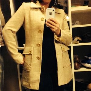 Gorgeous coat. Cream and caramel color