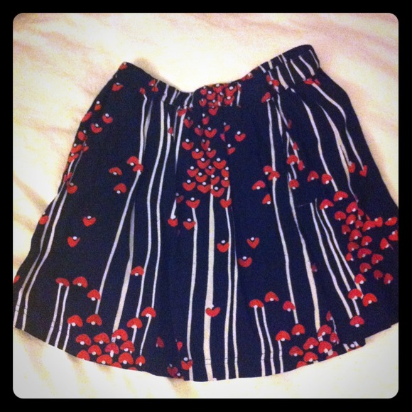 Printed mini skirt with pockets and elastic waist