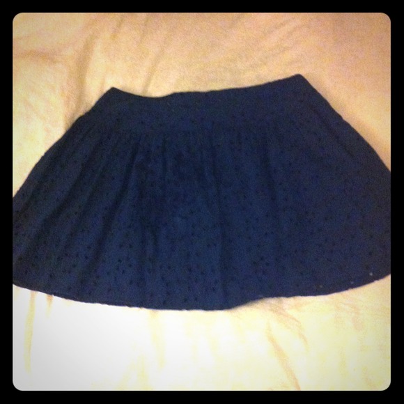 Navy eyelet mini skirt with zipper on back