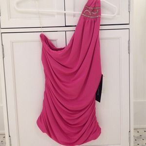 Cute pink one shoulder top with beads. Never worn!