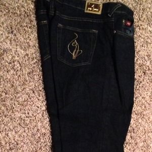 Black denim baby phat jeans.