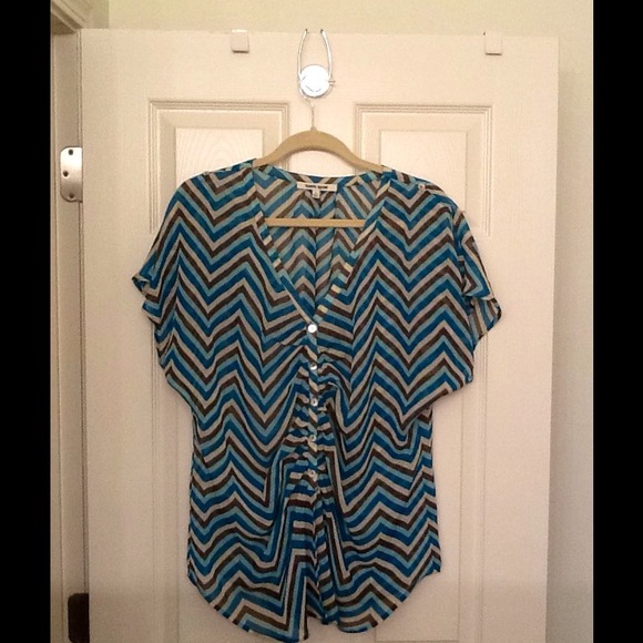 Sz medium.  Sheer Daniel Rainn top.