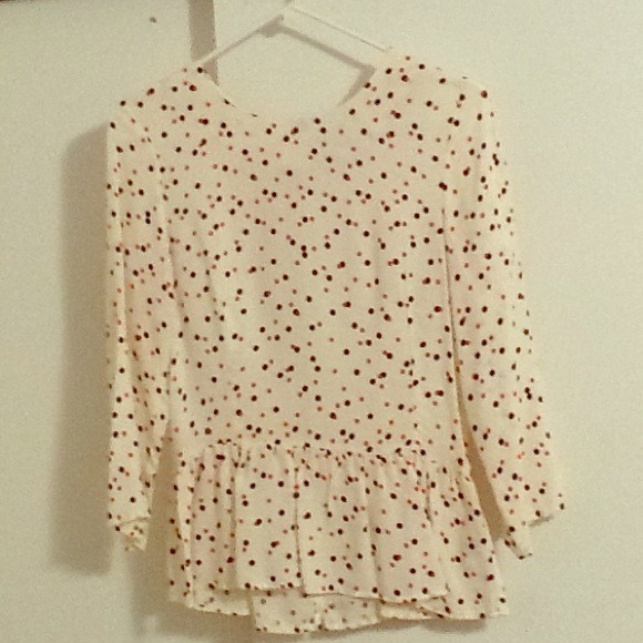 Polka-dot peplum top