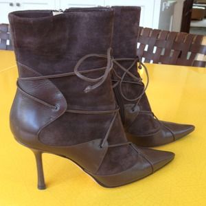 Bundled with Louboutin and Prada boots