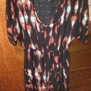 Dress or swim suit cover.