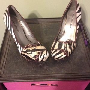 Zebra print and purple pumps