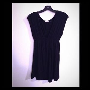 Long, low v-neck, cotton black top.