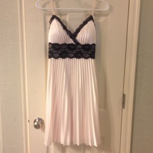 Cream and black lace cocktail dress