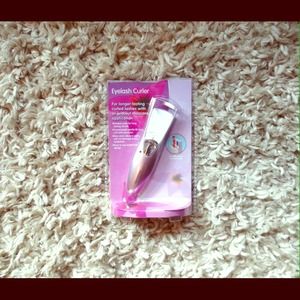 Heated eyelash curler