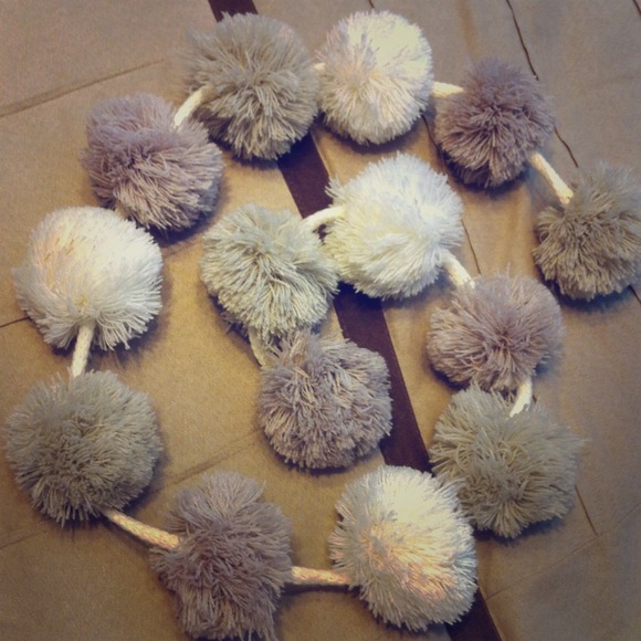 Scarf. I call it a poof ball scarf :)